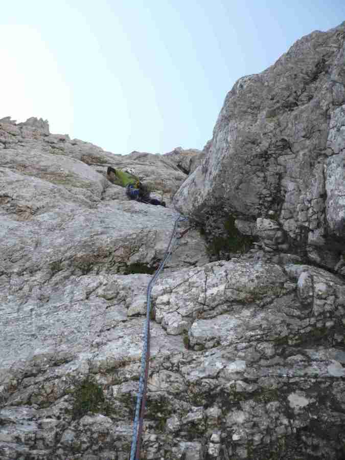 Jef leading the second pitch after a quite heavy rock slide